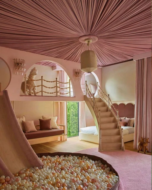 Whimsical child's bedroom interior with a ball pit, slide, stairs to a bed, and a rocking horse, all in soft pastel shades of pink.