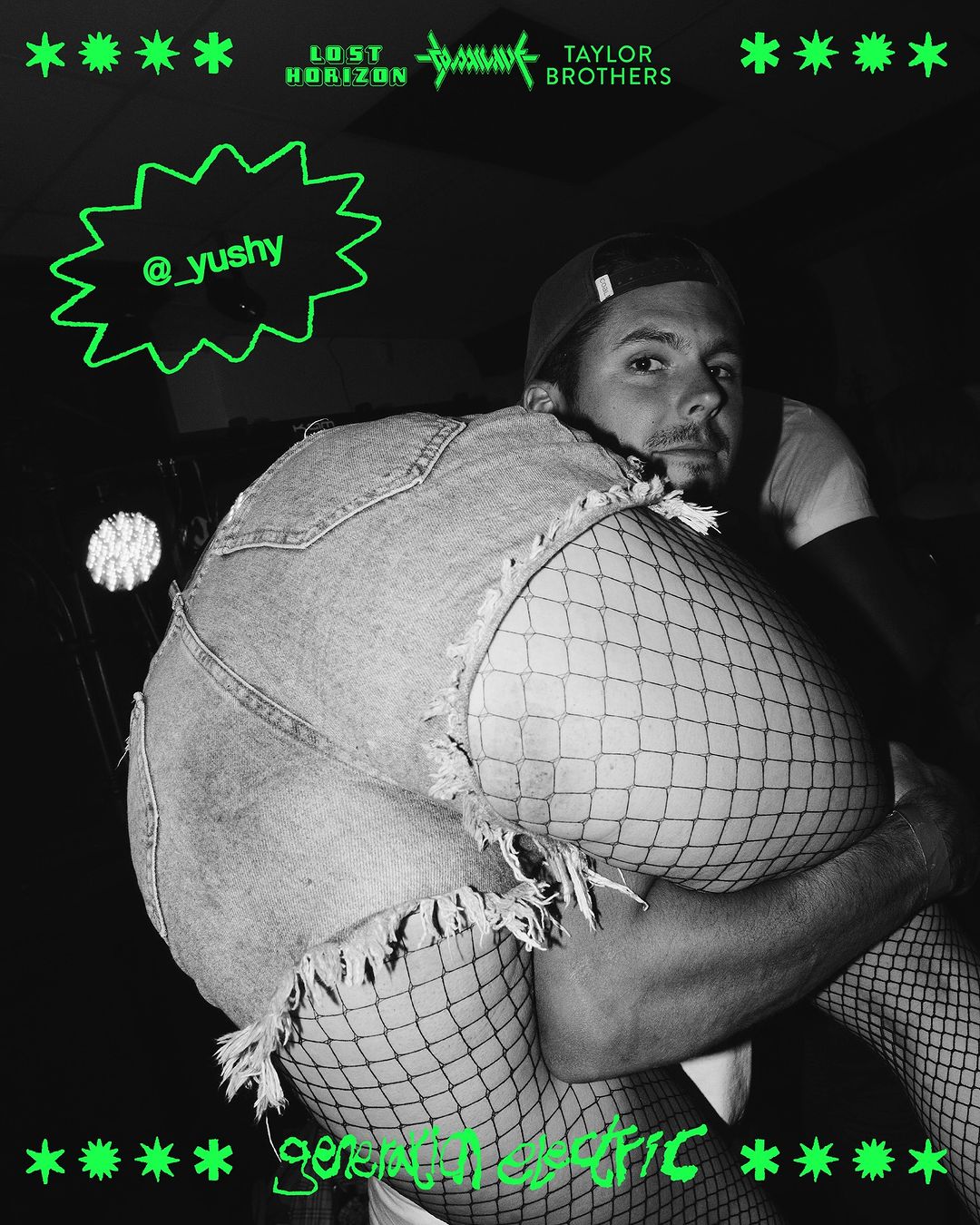 Monochrome indoor shot of a man in a cap carrying a person in fishnets and denim shorts, with neon text and stars.
