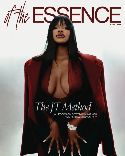 Magazine cover featuring a model wearing a dark red jacket and dress against a gradient background, jewelry, and long dark hair.