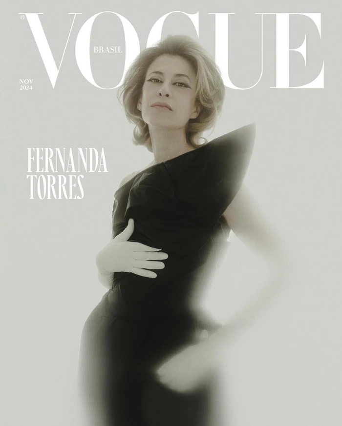 Magazine cover featuring Fernanda Torres in a sculptural black dress with white gloves against a light background.