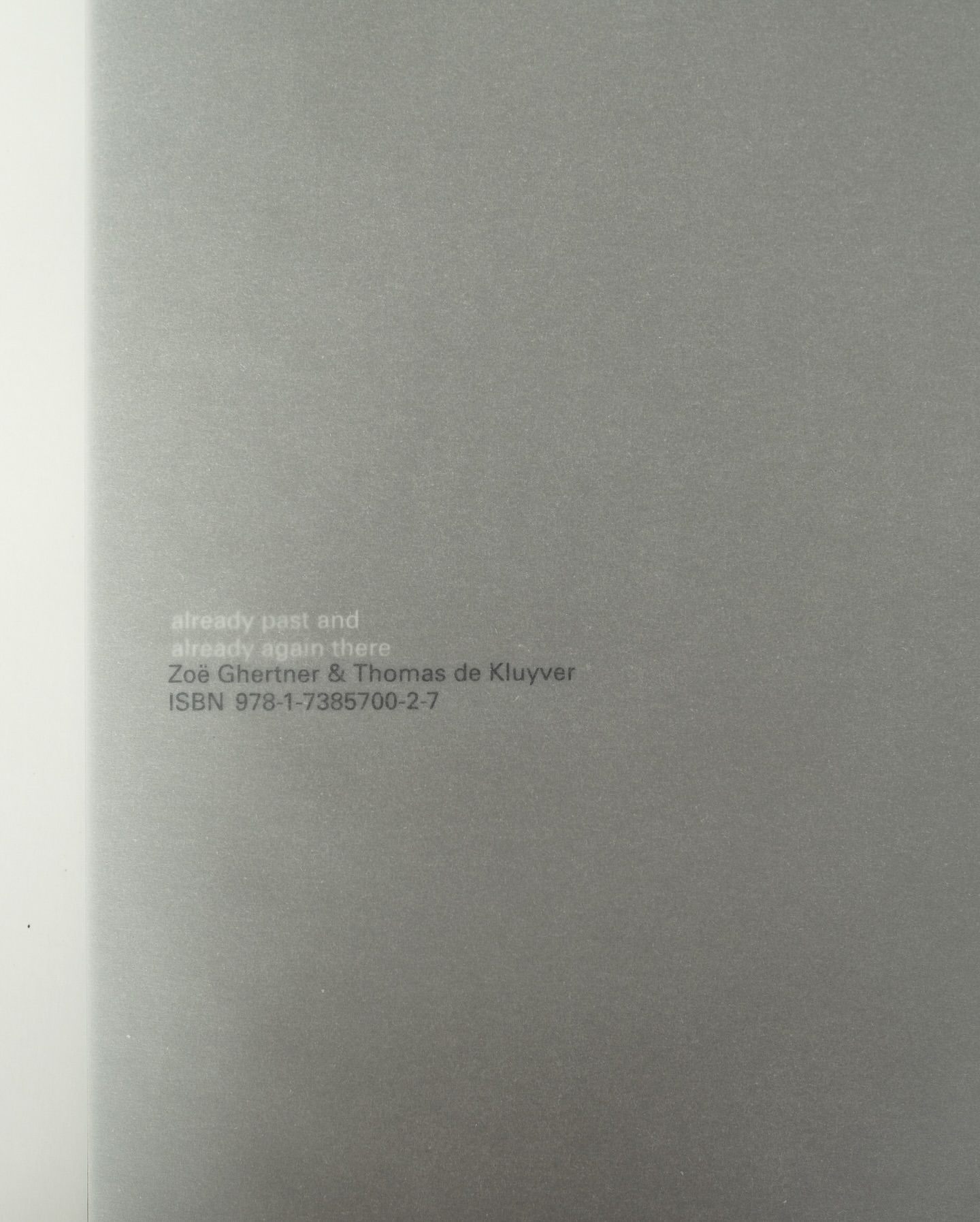 Book cover in gray tones with the title and authors listed: 'already past and already again there' by Zoë Ghertner & Thomas de Kluyver.