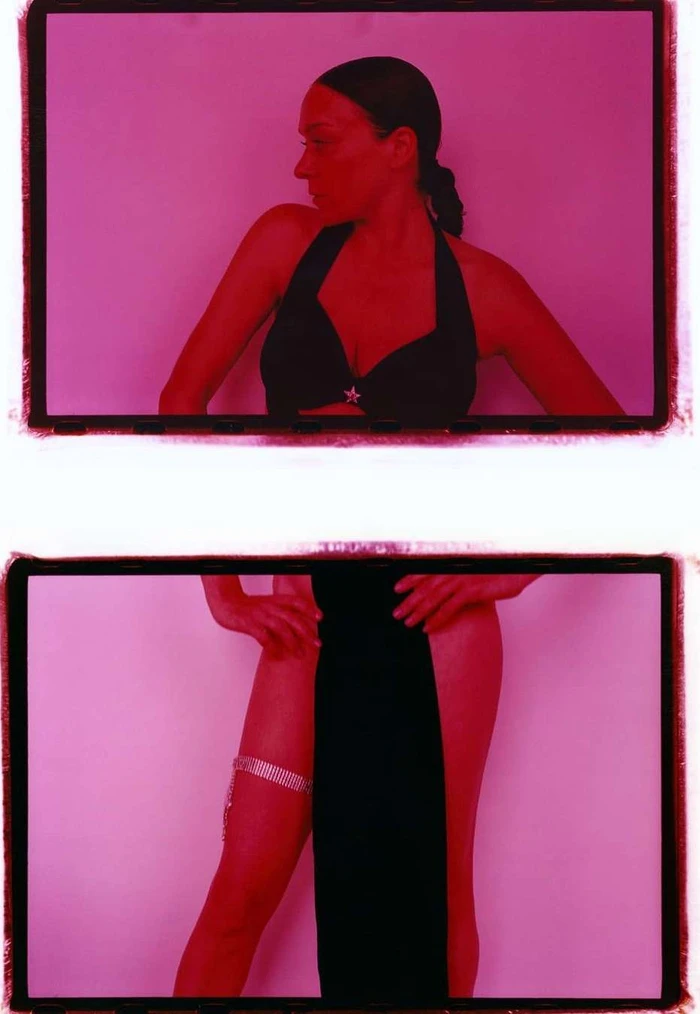 Two stacked film frames showing a woman in a black halter top and skirt against a pink monochromatic backdrop photographed by Zora Sicher.