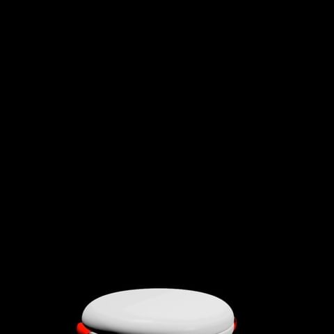 Elevated white platform with red trim against a stark black background, spotlighted to enhance product display.