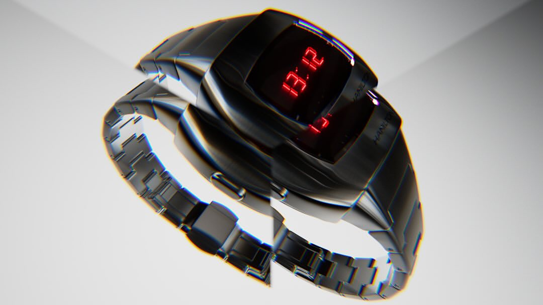 Close-up studio shot of a digital wristwatch with a metal band displaying '13:12' in bright red numbers against a gradient white backdrop.