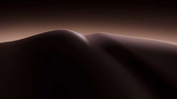Abstract view of curved dunes under soft lighting creating shadows and gradients in neutral colors and subtle atmospheric perspective.