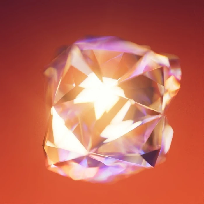 Close-up CGI rendering of a glowing, multifaceted abstract crystal object against a warm red background.