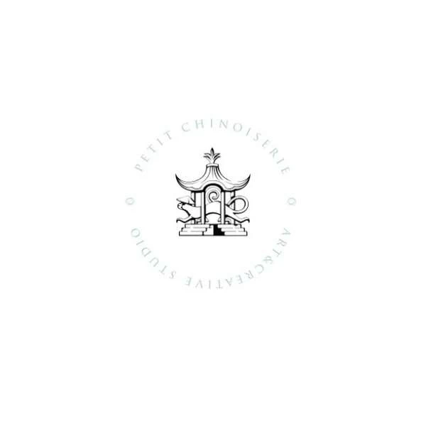Logo for Petit Chinoiserie Creative Studio featuring a pagoda structure, oriental dragon statues, and stylized typography.