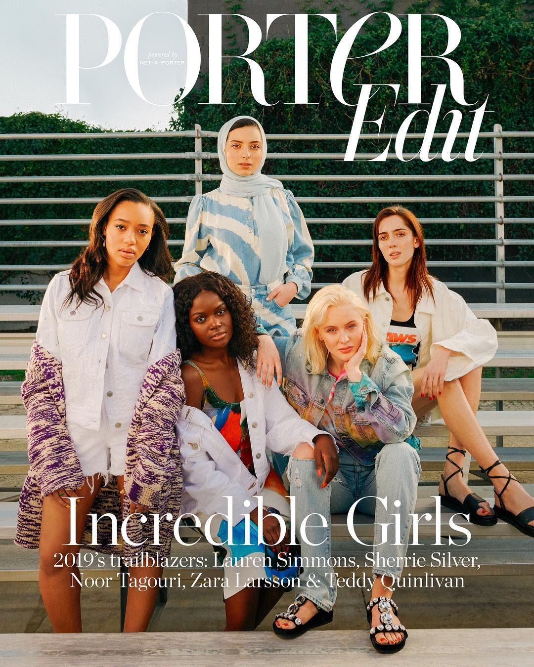 Group of five women on bleachers for Porter Edit cover. Diverse ethnicities, fashion styles, casual wear, outdoor setting, natural light.
