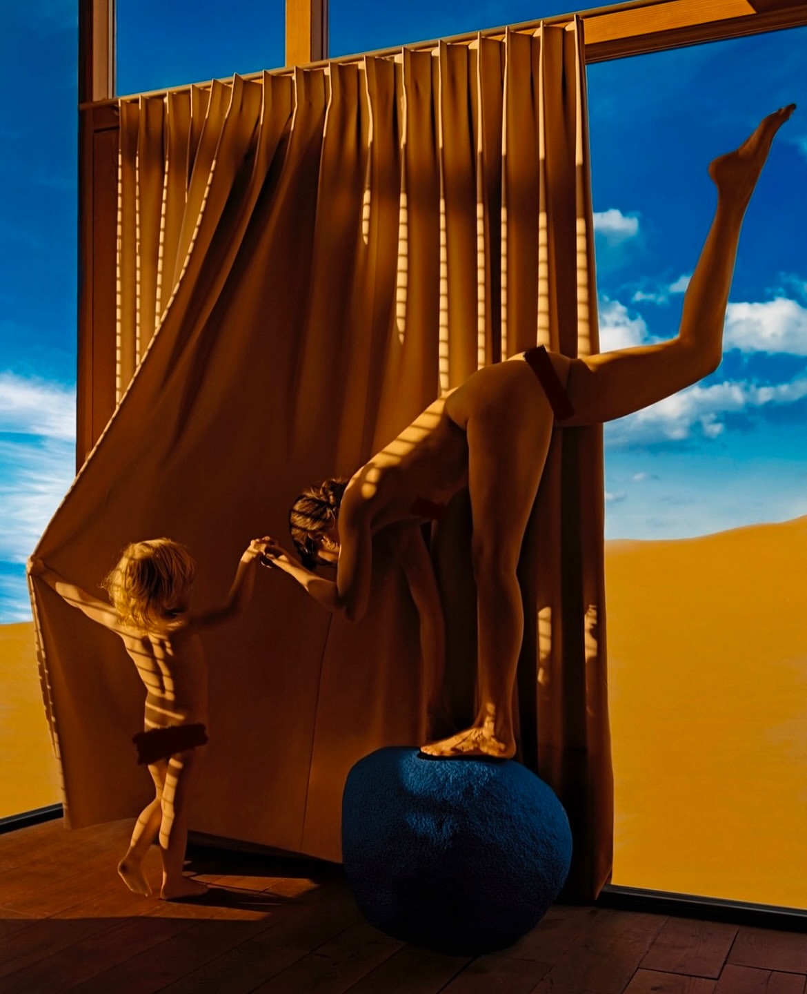 Mother and child perform yoga-like balance poses in front of a desert vista framed by curtains and window, artistic, color grading.