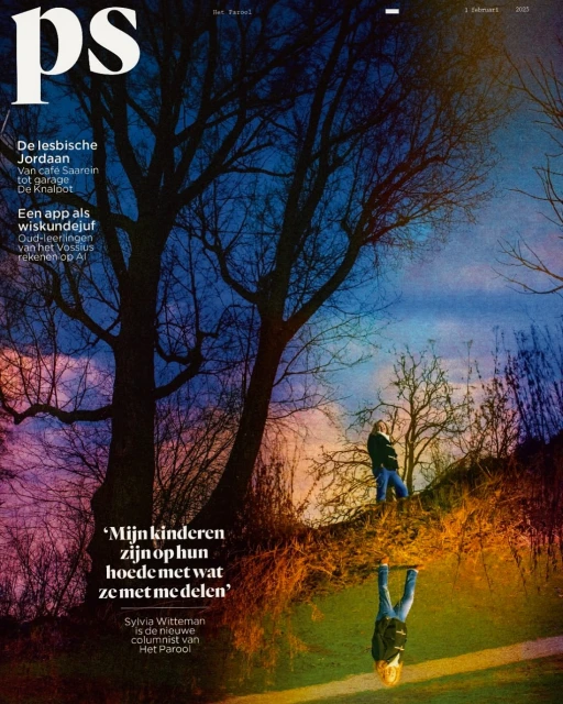 Magazine cover featuring a person standing on a mound of grass, with a reflection below, set against a backdrop of trees and dusk sky.