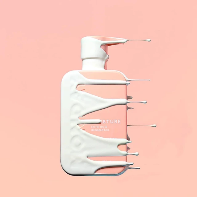 Product shot of a light pink bottle of hair product with white liquid dripping down the sides on a light pink background.