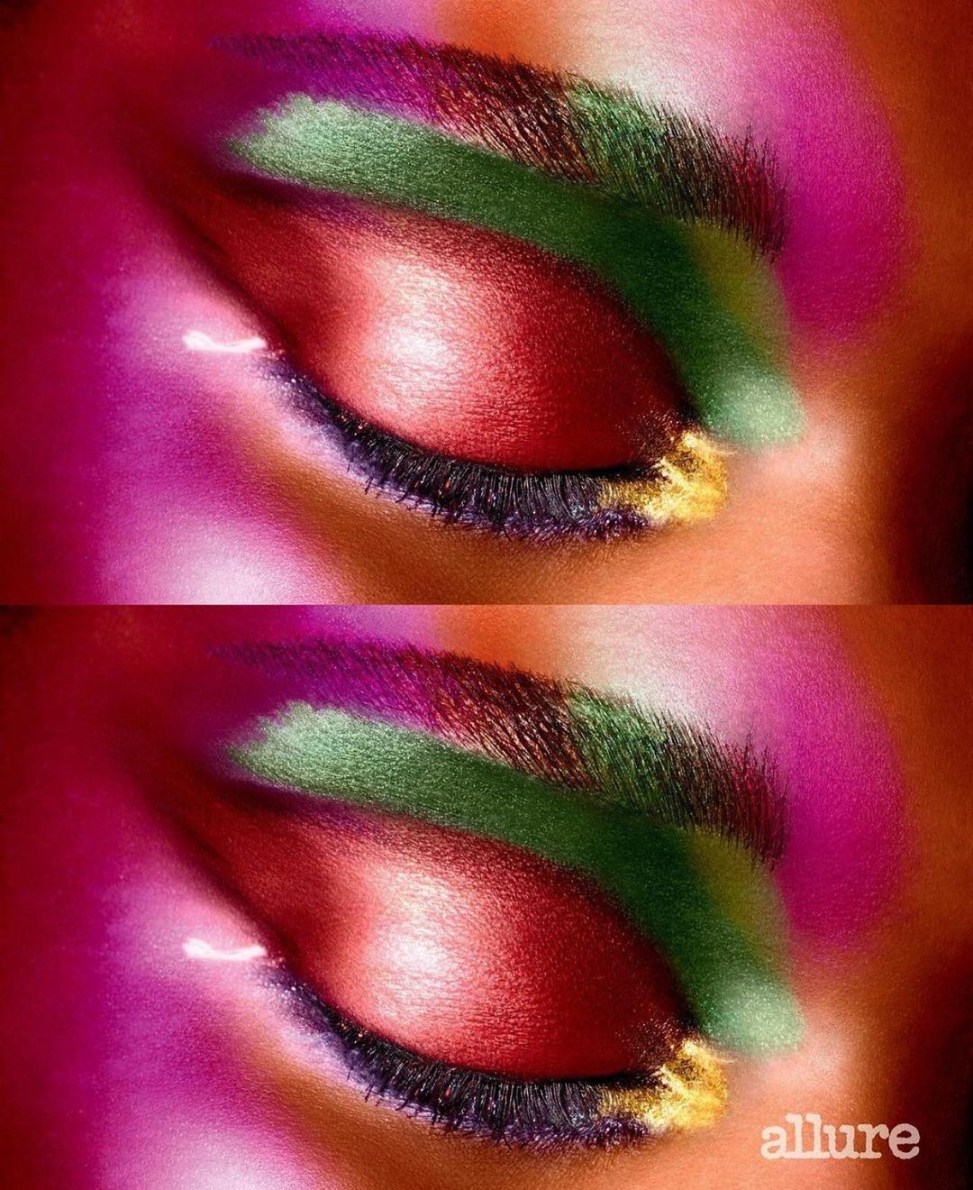 Close-up of an adult female eye with multi-colored eye shadow in shades of red, green, purple, and gold and long black eyelashes.