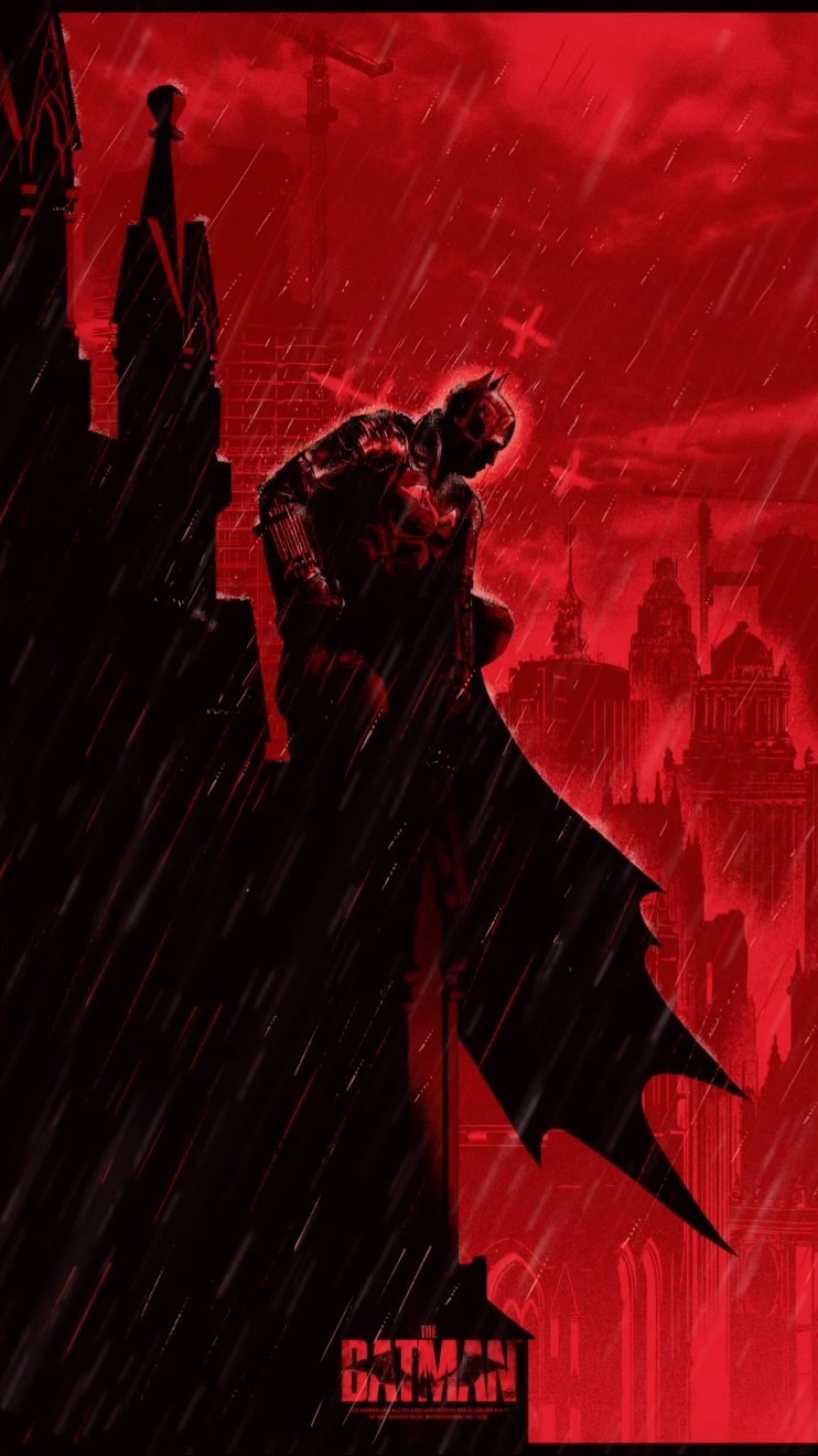 Illustration of Batman crouched on a gothic building, silhouetted against a red cityscape in the rain, with the 'Batman' logo visible.