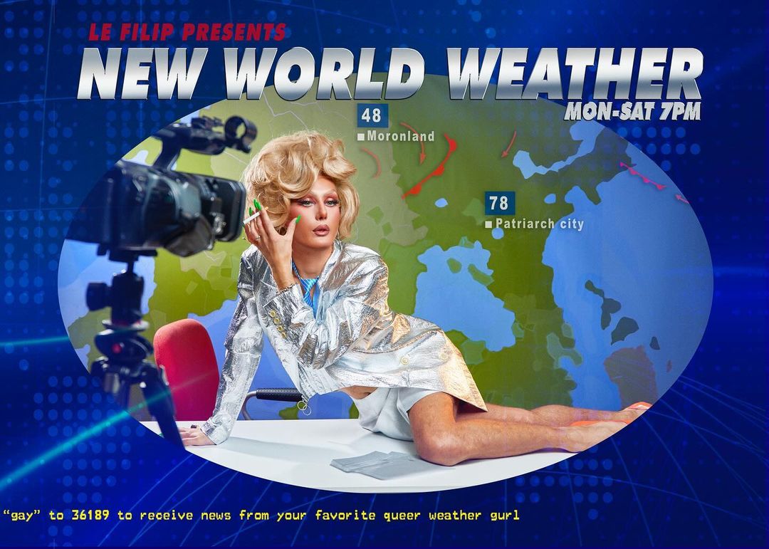 Drag queen in silver outfit at a desk with a camera, against a weather-map backdrop, bright lighting, and bold text.