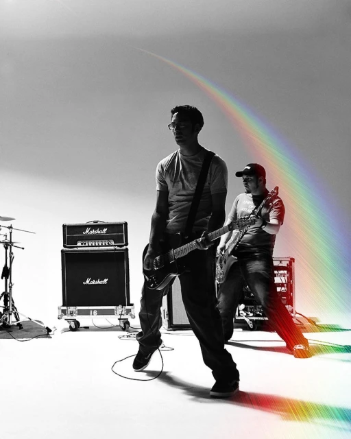 Two musicians play electric guitars on a white background with lighting gear and Marshall amps, highlighted by a rainbow filter effect.