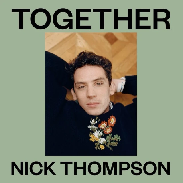 Portrait of Nick Thompson wearing a floral sweater. He is lying down on a wooden floor. Text overlay: TOGETHER, NICK THOMPSON.
