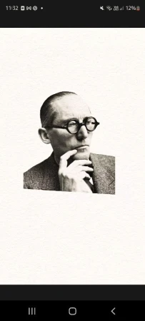 Portrait of a man with glasses in grayscale, wearing a suit and tie, with his hand to his face in a thoughtful pose.