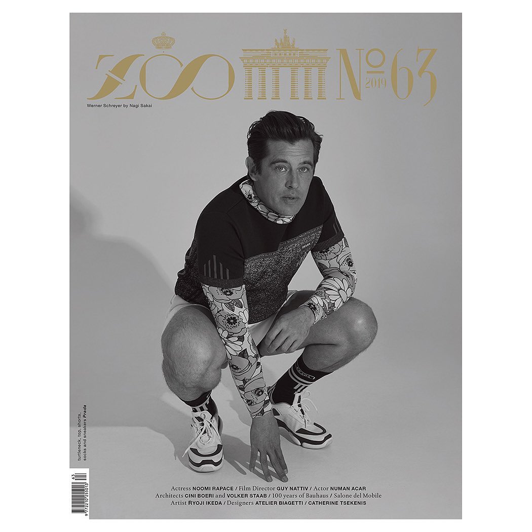 Zoo Magazine cover featuring a man in a patterned shirt and shorts crouching down. The magazine's logo and issue number are at the top.