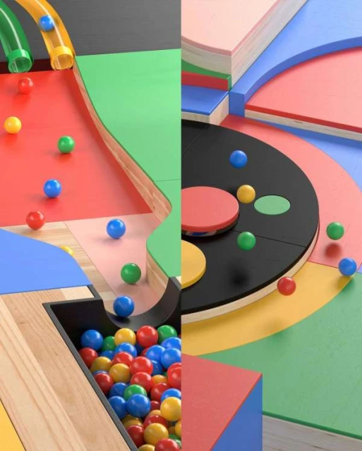 Colorful marble run with vibrant red, blue, green, and yellow accents and a collection of marbles in a holding box.