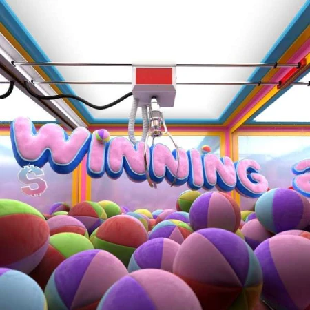 Close-up of a claw crane game filled with colorful beach balls and text 'Winning' in pink and blue, symbolizing games and prizes.