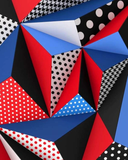 Abstract geometric art of blue, red, black and white triangular shapes with polka dot and houndstooth patterns creating an intricate design.