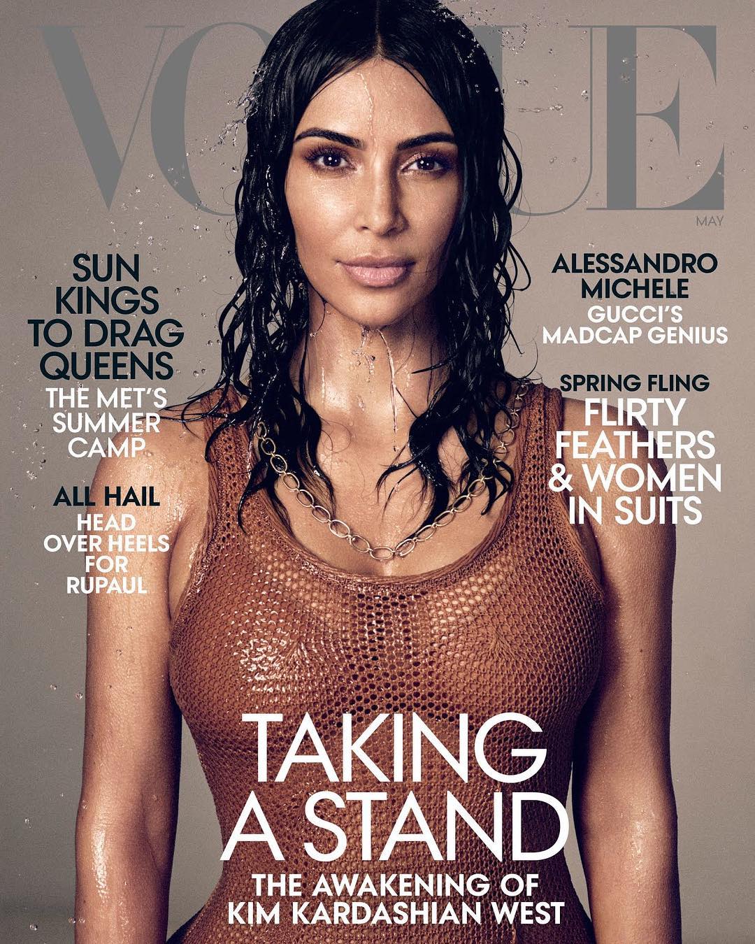 Vogue magazine cover featuring a portrait of Kim Kardashian with wet hair and a crocheted top, photographed in a studio setting.