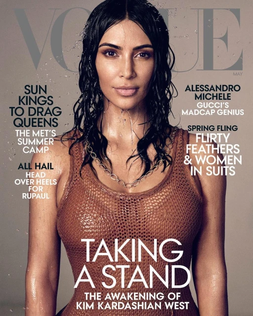 Vogue magazine cover featuring a portrait of Kim Kardashian with wet hair and a crocheted top, photographed in a studio setting.