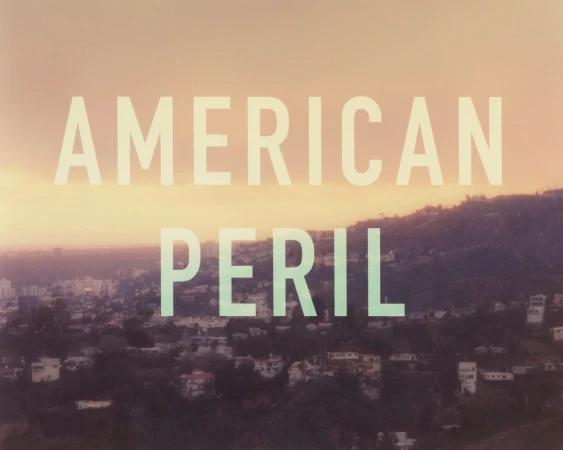 Hillside neighborhood under a gradient sky with overlaid text 'American Peril'.