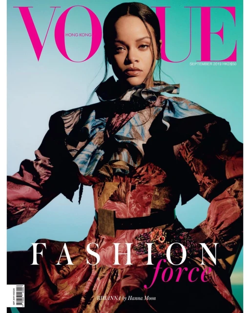 Vogue Hong Kong cover featuring Rihanna in a patterned dress against a light blue background, large Vogue masthead in pink.