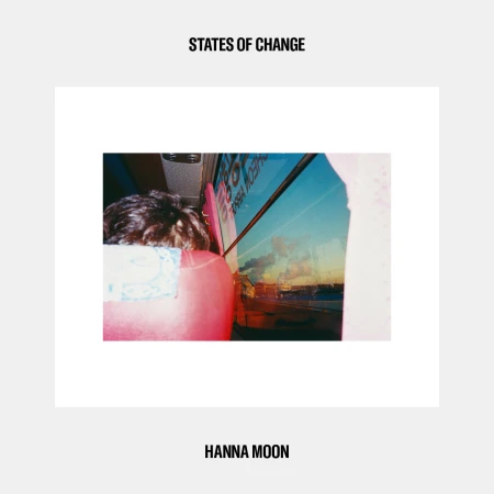 Artistic album cover featuring a partially visible person on a bus, looking out the window at a blurred urban landscape during sunset.