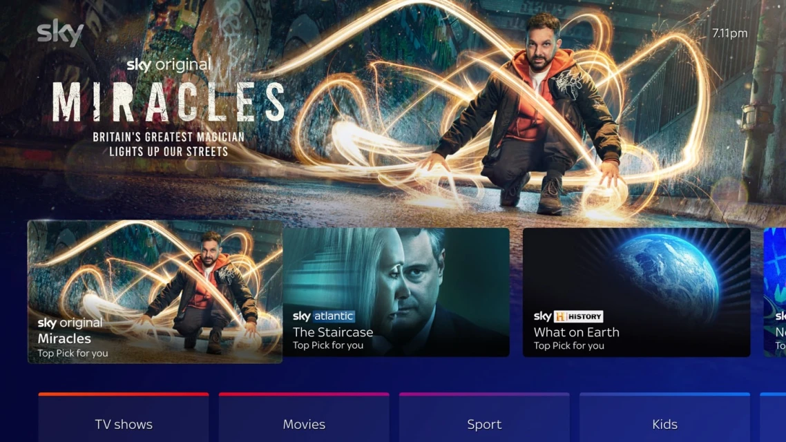 TV screen displays the Sky Original series 'Miracles' with a man crouched in a street, surrounded by glowing orbs, available on-demand now.