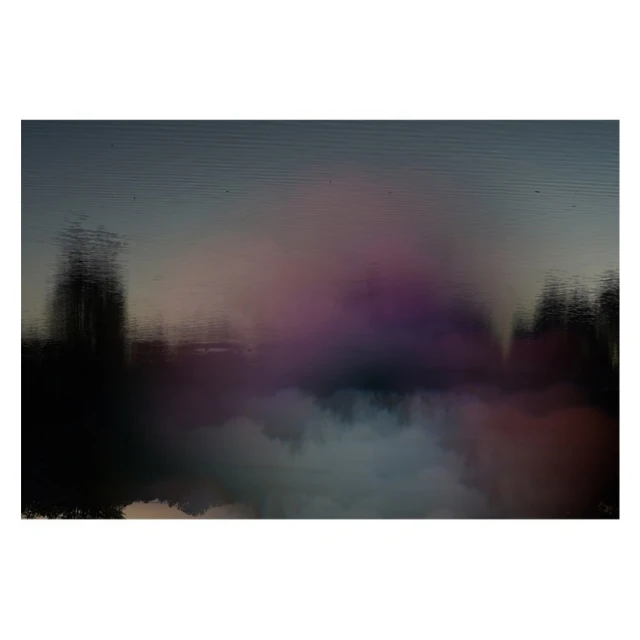 Abstract landscape art with blurry dark trees reflected in water under a dark sky with shades of purple and pink.