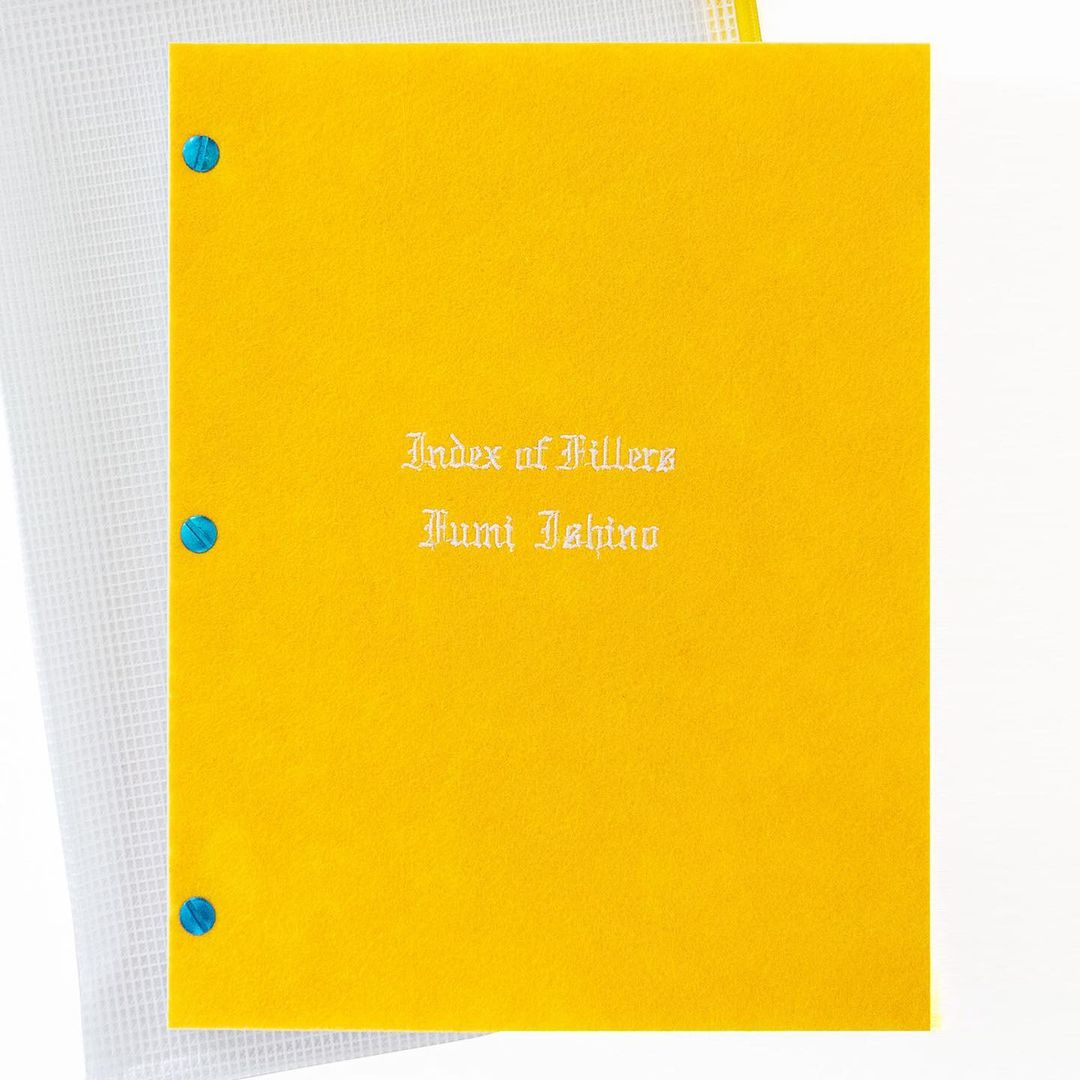 Index of Fillers book cover in yellow with white text and turquoise rivets, next to a white book with a crosshatch pattern.