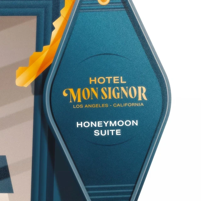 Stylized illustration of a vintage hotel room key fob for 'Hotel Mon Signor, Los Angeles, California, Honeymoon Suite' in teal and gold.