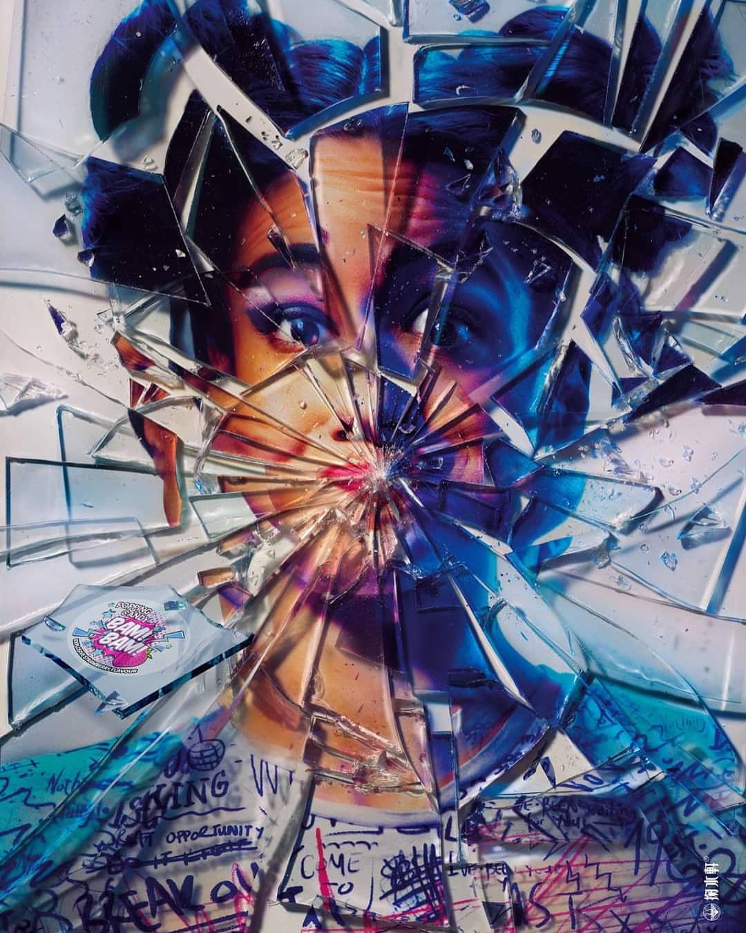 Portrait of a woman's face partially visible behind shattered glass, with handwritten notes and a sticker in the foreground.