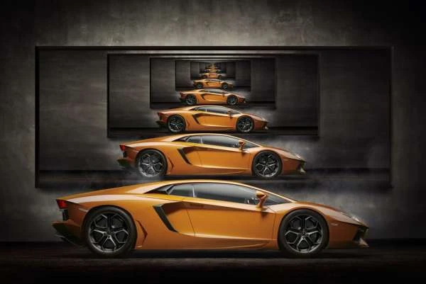 Four Lamborghini Aventador cars cascade in size, leading to a vanishing point, framed in dark grey concrete. Automotive design.