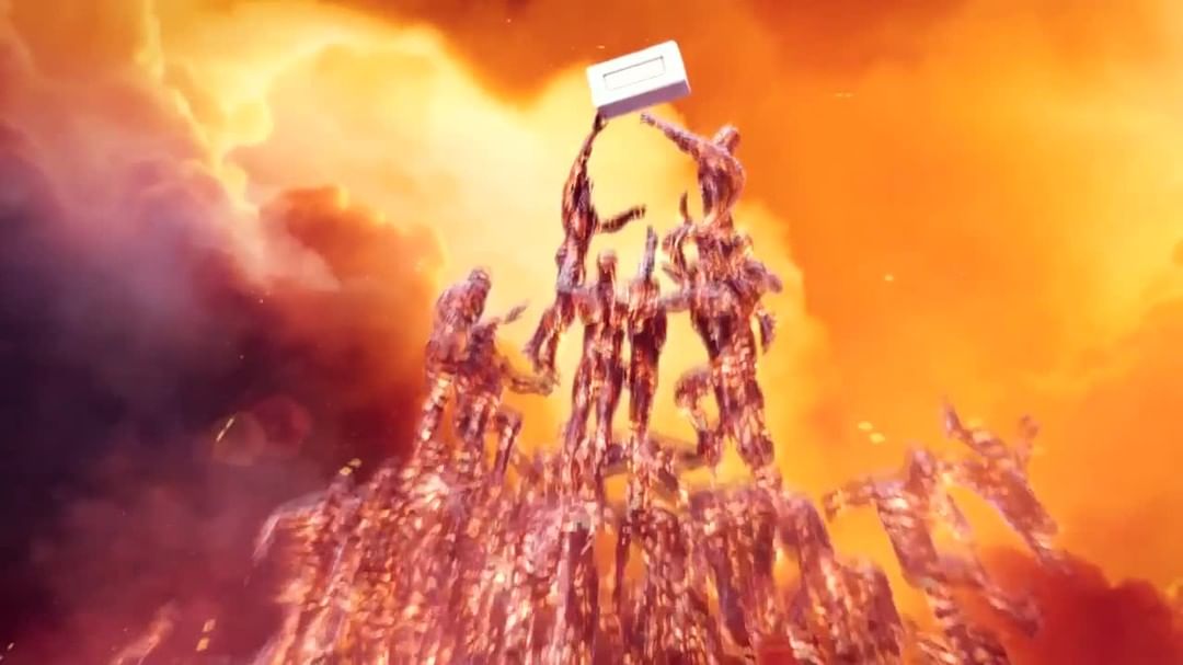 Abstract imagery featuring a group of statue-like figures holding a rectangular object aloft, set against a vibrant orange and red sky.