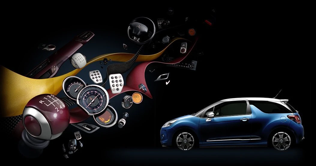 Blue Citroen DS3 car floats among its components—steering wheel, gauges, gear shift—in a dark studio environment, a car parts explosion.