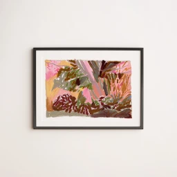 Framed pastel landscape illustration featuring pink and brown tones mounted on a plain white wall by Beya Rebai