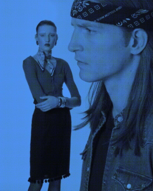 Two fashion models pose in a studio wearing a bandana, denim jacket, knit top, patterned scarf, jewelry, and pencil skirt with pom-pom trim.