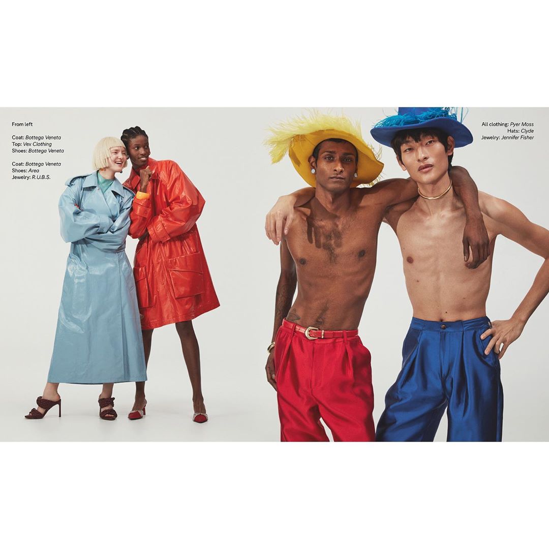 Fashion editorial featuring four diverse models in brightly colored clothing and hats, posing against a white backdrop in a studio setting.