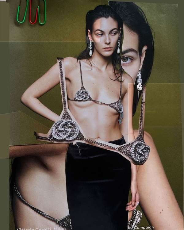 Fashion collage featuring a woman in jewelry bra and long black skirt, juxtaposed with oversized face fragment and paperclip details.