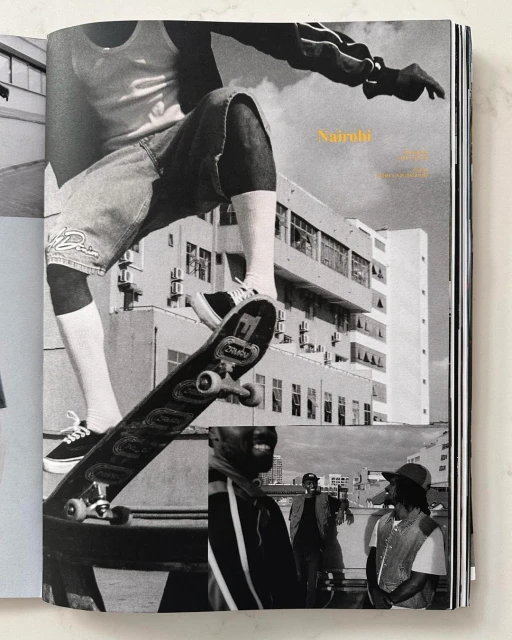 Black and white photo of a skateboarder performing a trick, with onlookers and urban architecture in the background, featured in a magazine.