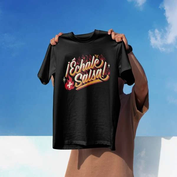 Black t-shirt with the text 'Echale Salsa' being held up against a blue sky with light clouds by a person in a tan shirt.