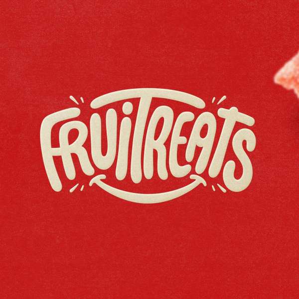 Close-up of a bright red background with the logo "FRUITREATS" in a rounded, playful white typeface.