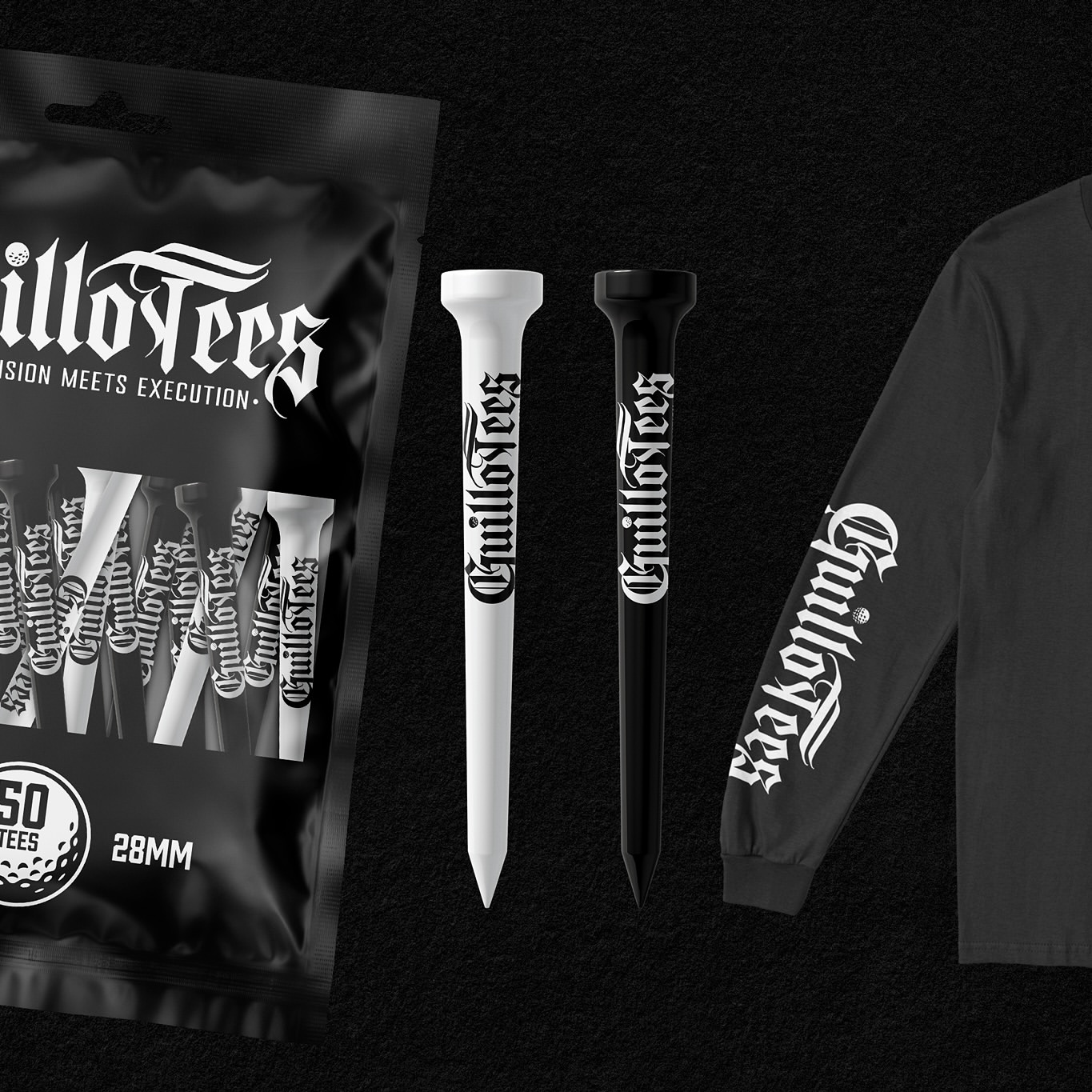 Close-up studio shot of black and white golf tees with Guillotees logo, displayed next to a matching logo-branded sleeve and packaging.