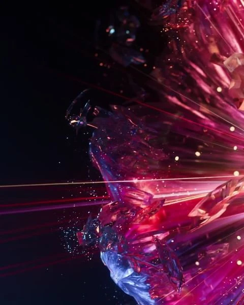 Abstract image of crystal shards with a burst of light, showcasing digital art and visual effects in pink, blue, and black tones.