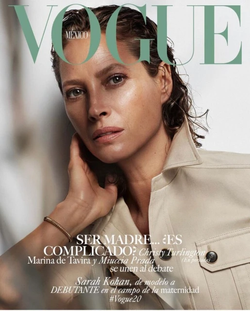 Close-up fashion shot of Christy Turlington on the cover of Vogue Mexico, featuring minimal makeup and a beige jacket with wet hair.