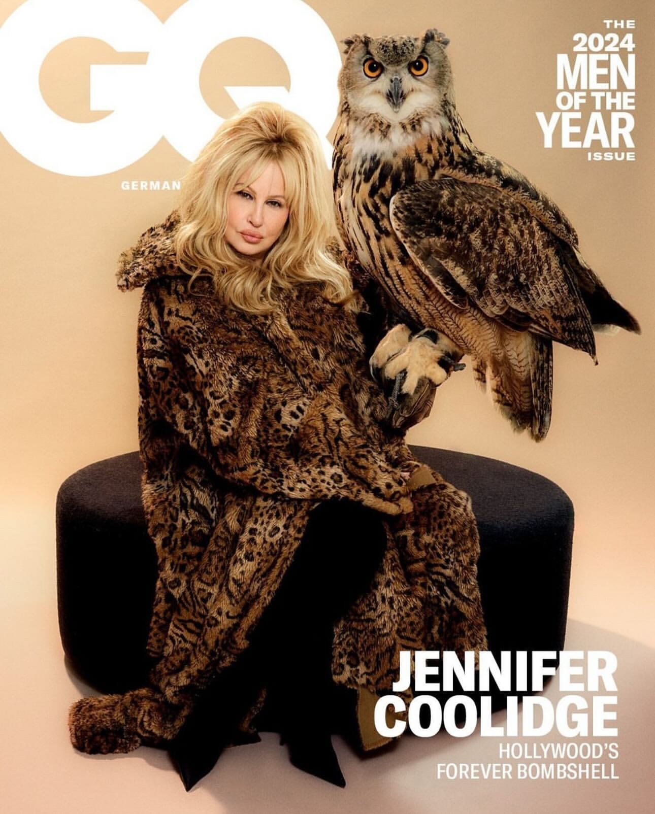 Jennifer Coolidge, actress, sits beside an owl on the cover of GQ Magazine Germany Men of the Year 2024, styled in animal print.
