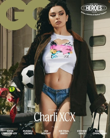 Charli XCX magazine cover; woman in cropped top, denim shorts holding soccer ball and Monster Energy can with GQ logo visible.